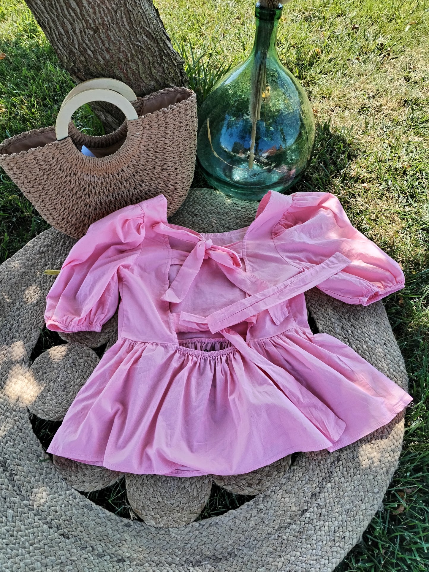 Blouse rose  dos nu à nœuds